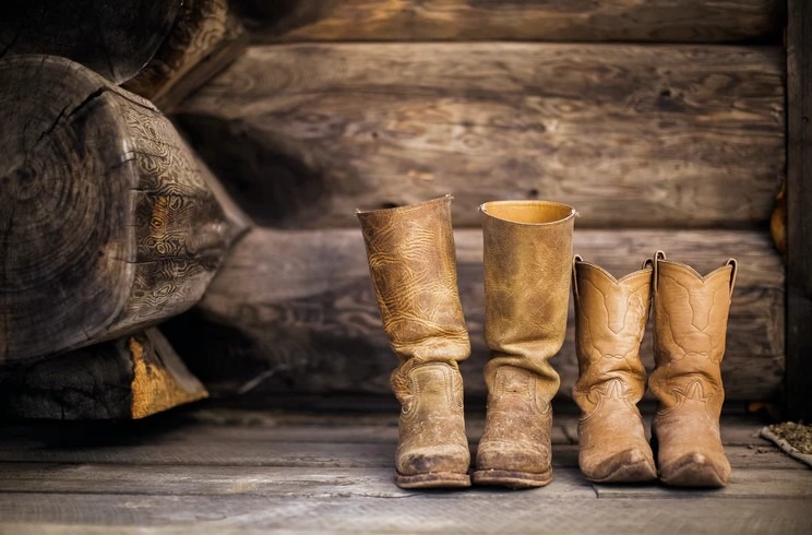 two pairs of leather boots