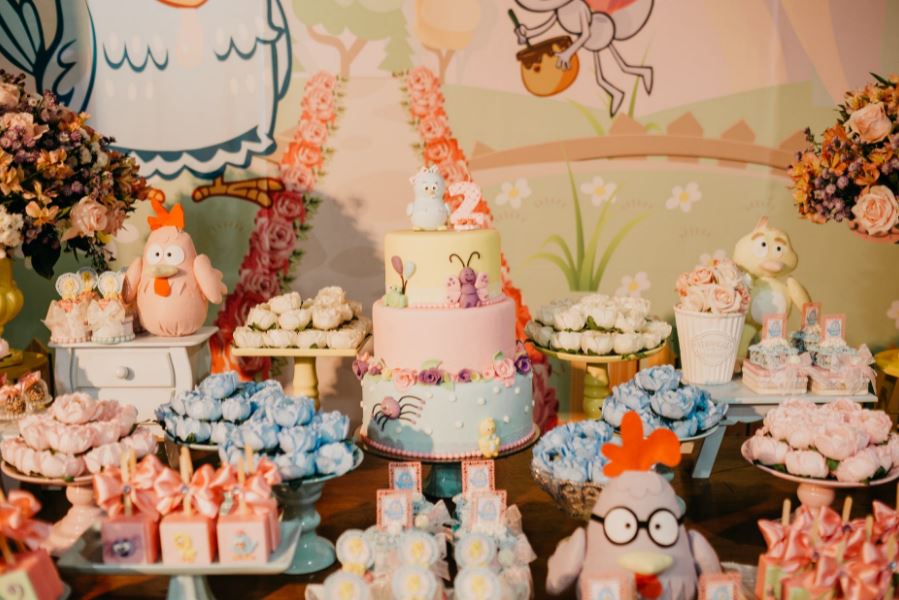 festive cake and cupcakes on a table
