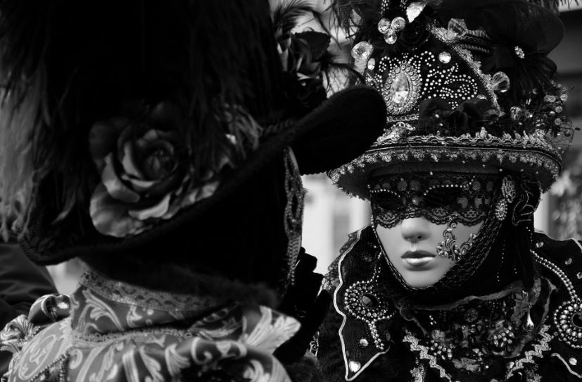 black and white photo of a person wearing mask