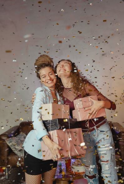 Happy girls with gifts