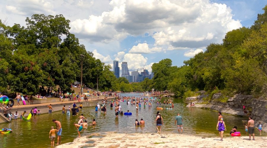 Barton Springs in Austin, Texas on a bustling Saturday afternoon